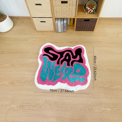 STAY WEIRD Rug